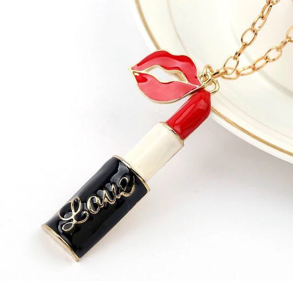 Necklace with lipstick and lips pendants
