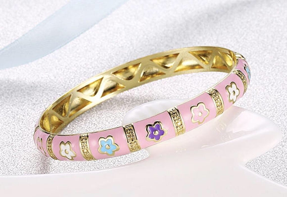 Pink bangle bracelet with flowers