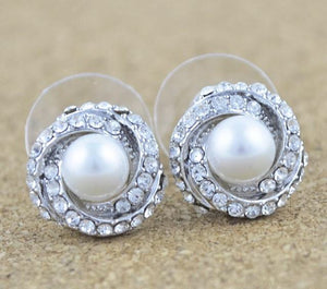 Swirl and pearl earrings