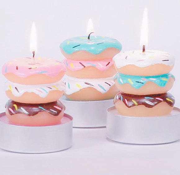 Three piece set of donut stacked candles
